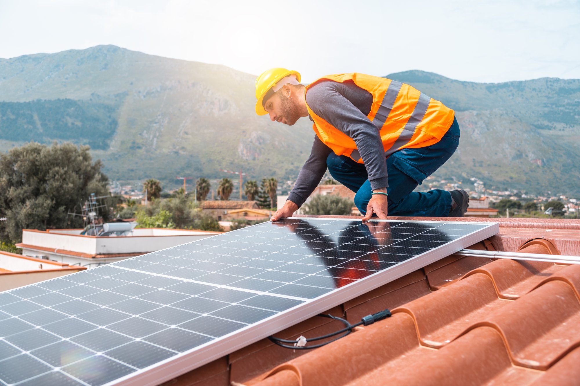 workers-assemble-energy-system-with-solar-panel-electricity